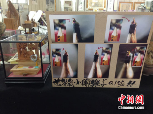 图为陈逢显所做世界最小雕刻猴子,仅0.1公分大小。