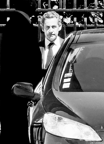 7月2日,在法国巴黎,法国前总统萨科齐离开自己的住所。 新华社发 7月2日,在法国巴黎,法国前总统萨科齐离开自己的住所。 新华社发