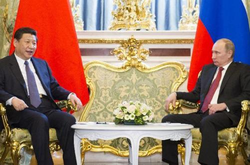 2013��3��22�գ�������ϯϰ��ƽ��Ī˹�ƿ���ķ�ֹ������˹��ͳ�վ����л�̸��