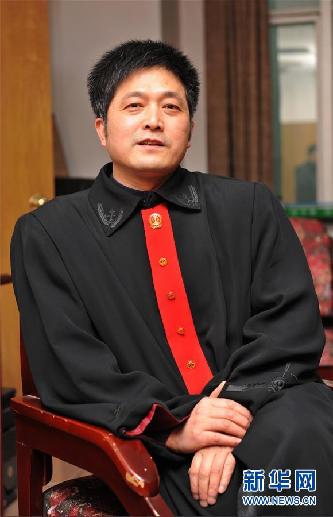 (图文互动)其人如兰,既洁且馨——追记“全国模范法官”胡国运