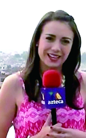 墨西哥女记者报道洪水让居民抬着走 已被解雇 墨西哥女记者报道洪水让居民抬着走 已被解雇