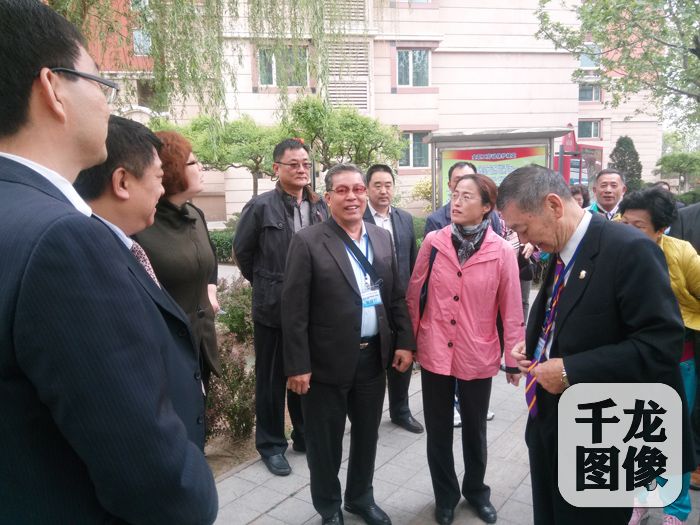 到新村街道怡海花园参访。