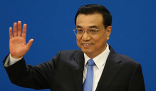 李克强反问外媒记者:你在中国买房了吗?