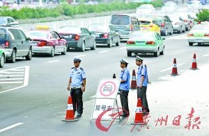 广州亚运机动车限行今全面展开 按单双号执行