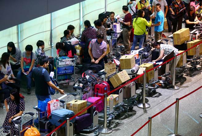 赴台旅客数预估将于12月突破千万人次大关。(图/《中时电子报》)