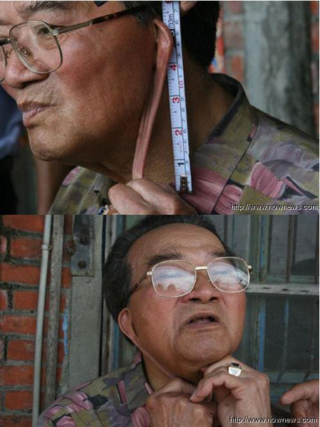 台一老人双耳垂肩长达16厘米 民众摸耳求福气(图)